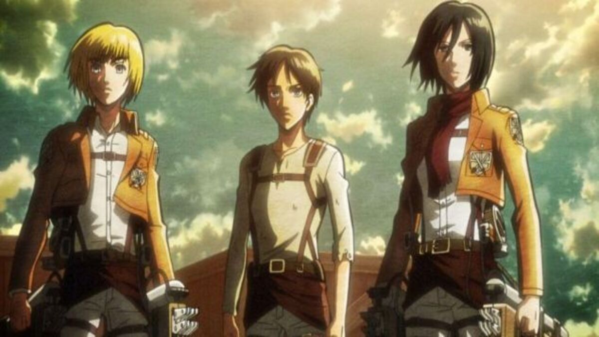 Eren Jaeger, Mikasa Ackerman e Armin Arlert in una scena di Attack on Titan, uno dei Migliori Anime da vedere di sempre