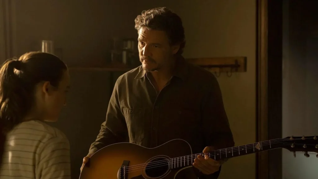 Joel regala a Ellie una chitarra nel flashback del sesto episodio di The Last of Us 2