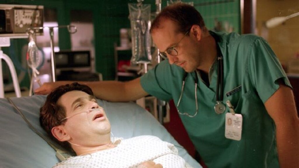 Il Dr. Greene con un paziente